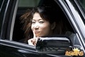 Pig-tailed Asian cutie Asako changing tires in her sexy lingeria